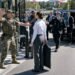 Женщину не пустили через ворота, не зная, что она была почётной гостьей церемонии